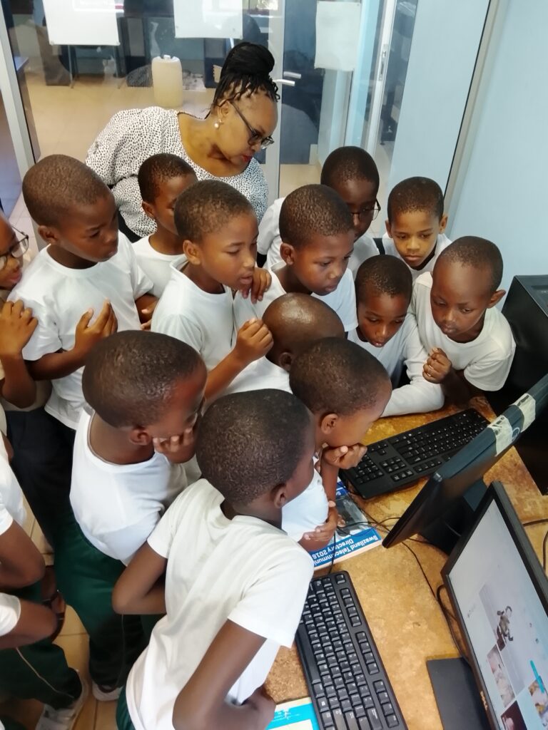 Shots of children and librarians sharing stories in their mother tongue at thePigg’s Peak Public Library, Eswatini